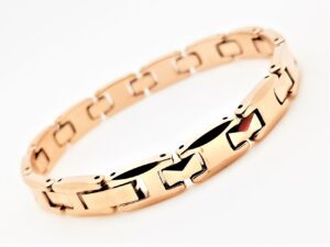 Elegant gold bracelet on white background